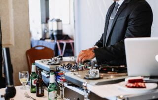 dj-playing-music-at-a-party-celebration-wedding-dancing-dance_t20_vKrAvv